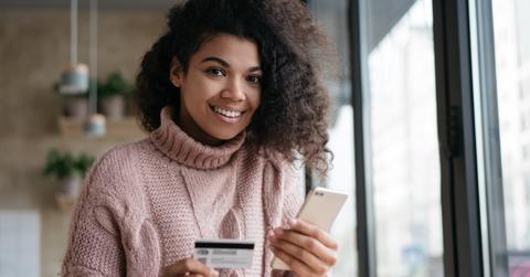 A woman using a credit card