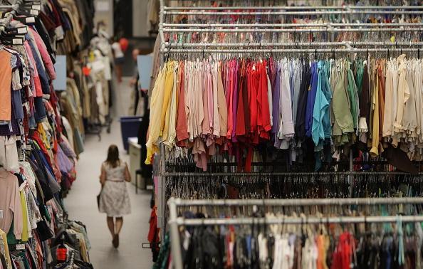 Woman walking through the aisles of a store