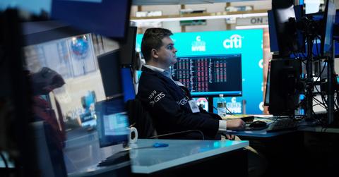 Stock trader looking at inflation data