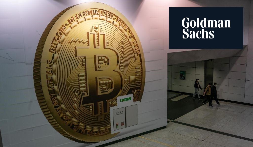 Goldman Sachs logo over Bitcoin sign