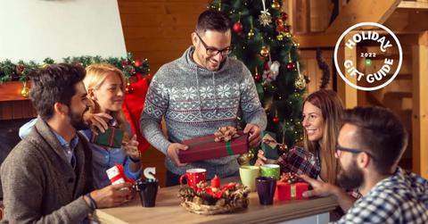 People exchanging white elephant gifts