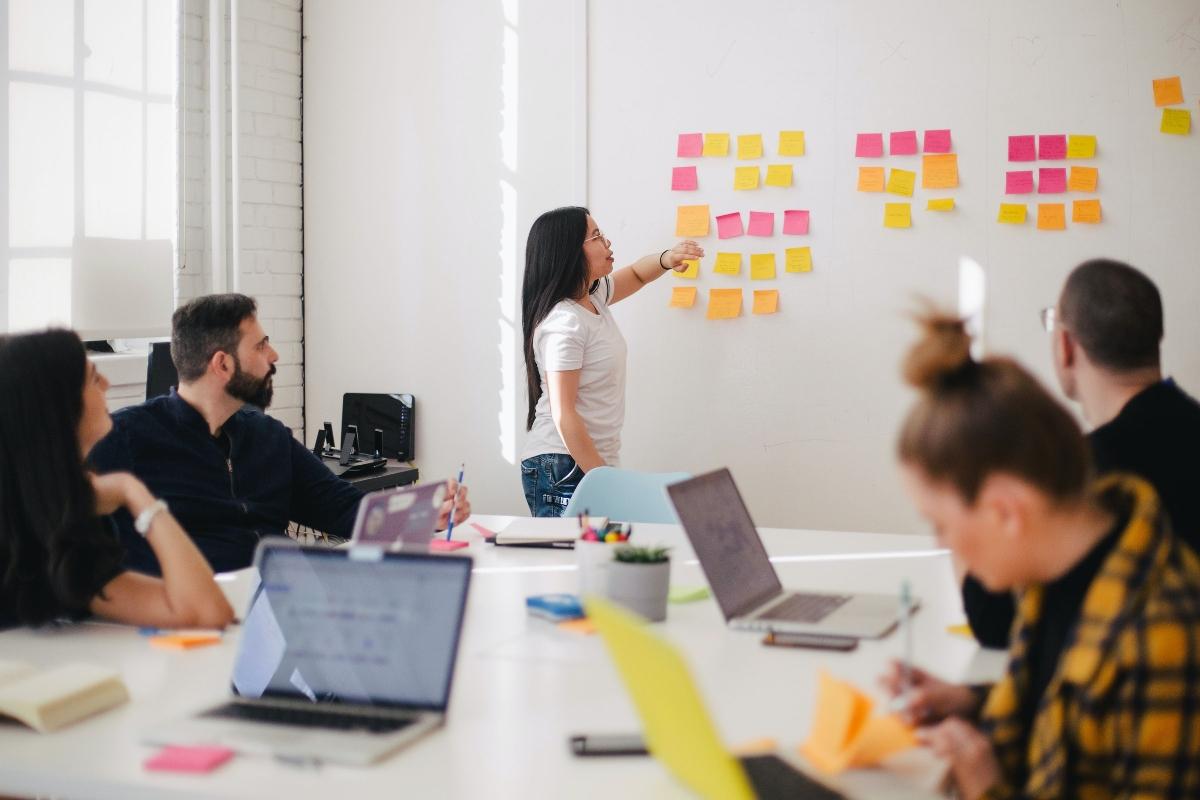 A woman leading office meeting