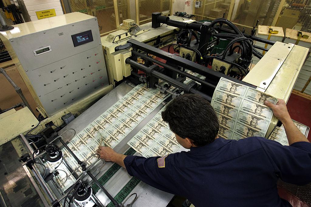 A man printing money