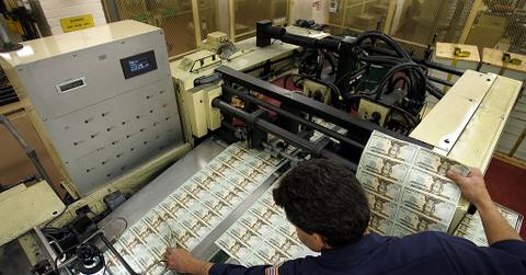 A man printing money