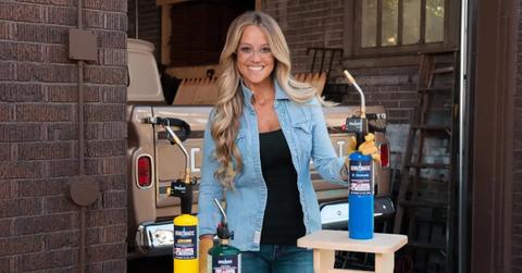 Nicole Curtis holding a Benzomatic product.