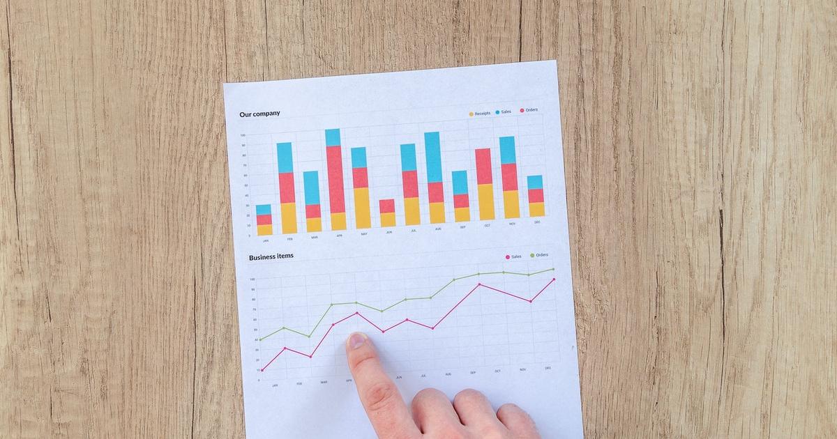 Person analyzing buyback data