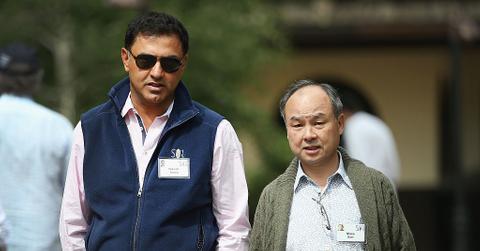 Softbank President and COO Nikesh Arora (L), SoftBank founder and CEO Masayoshi Son (R)