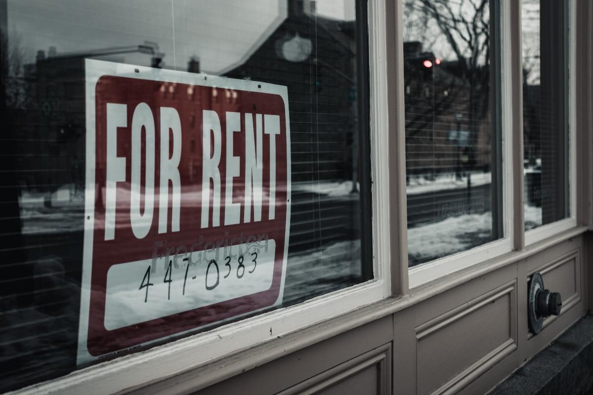 A for rent sign in a window