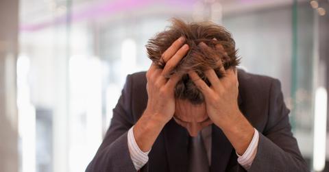 Stressed businessman running late