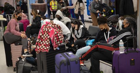 Travelers waiting at an airport