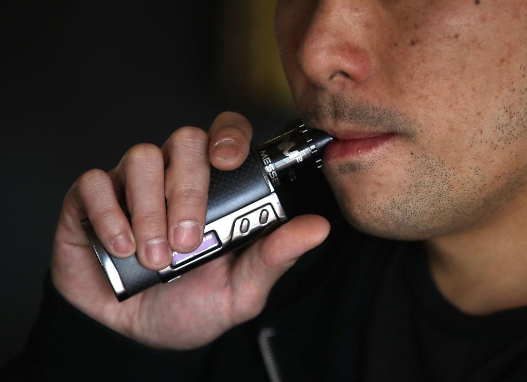 Man using a vaporizer