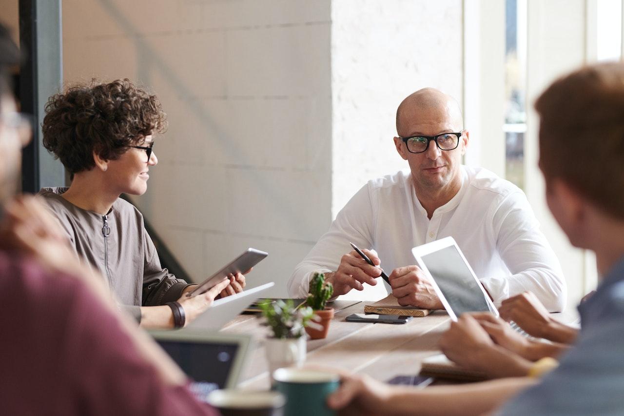 A man meeting with a focus group