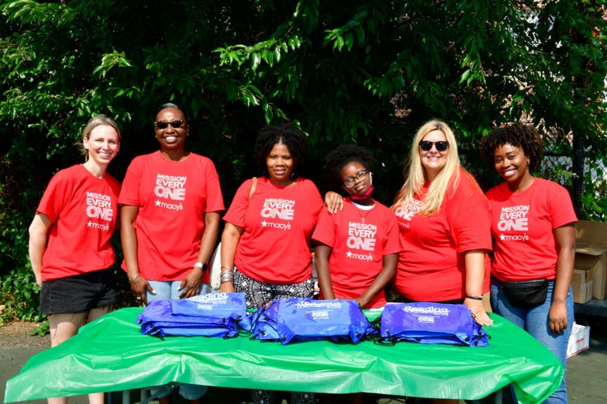 Employees at a reading charity drive in 2022