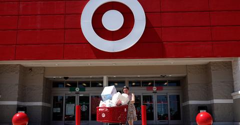 A person leaving Target with a full cart