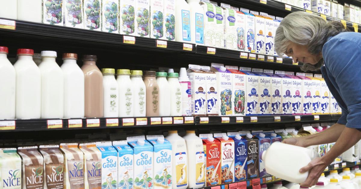 Shopper buying milk