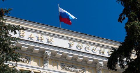 Russia flag flying over a bank