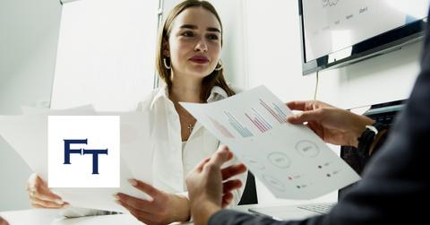 A person explaining graphs