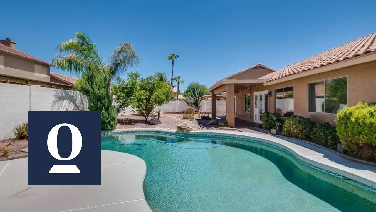 House with a backyard pool