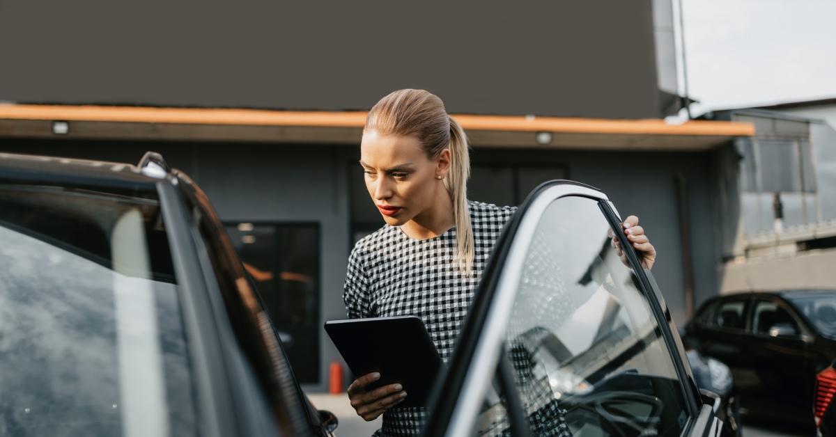 A woman shopping for a used car.