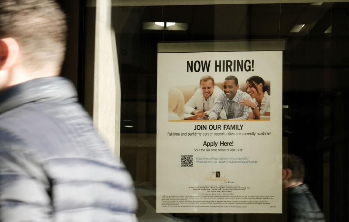 A "now hiring" sign