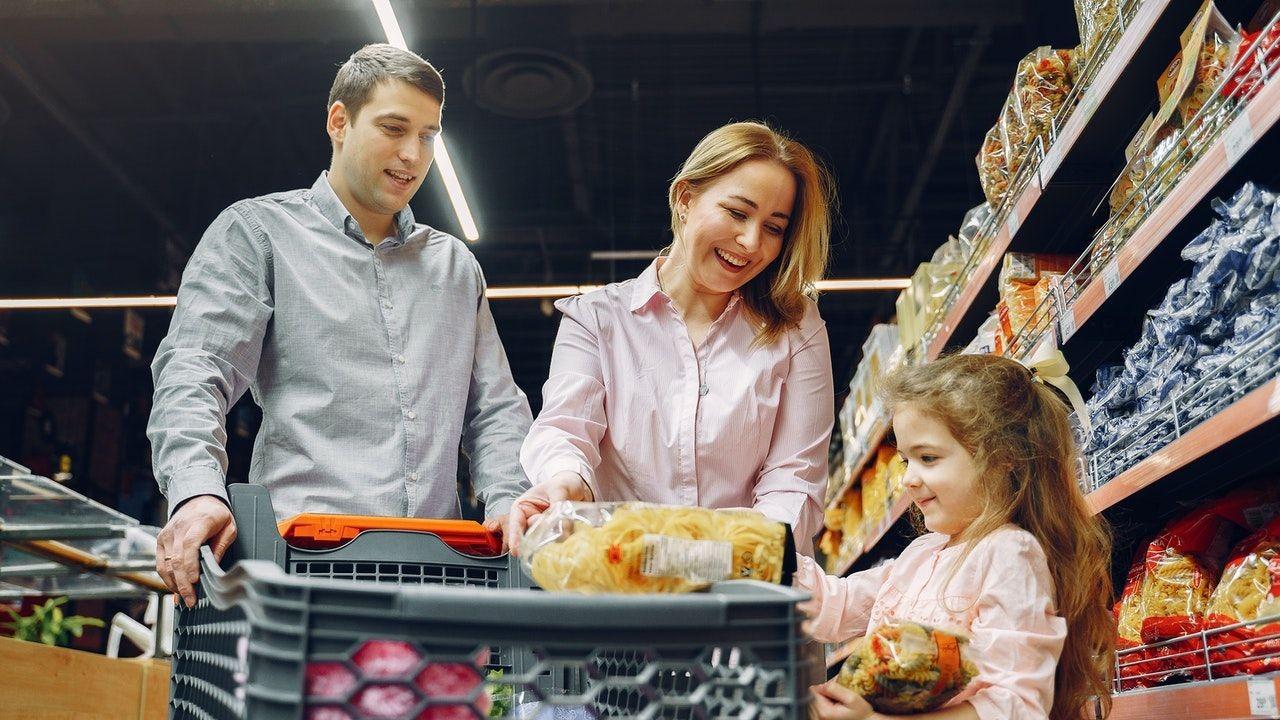 A family buying groceries