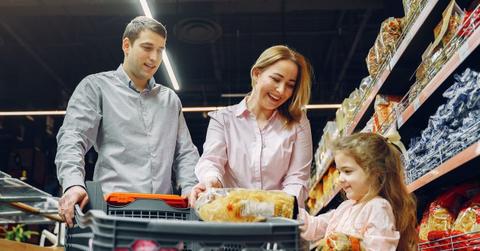 A family buying groceries