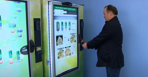 A man using a weed vending machine