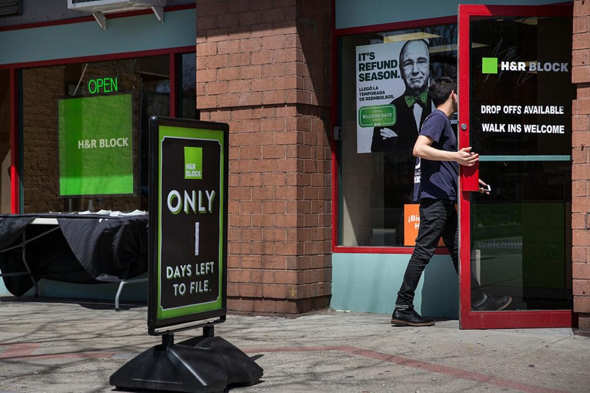 Man walking into a tax preparation office