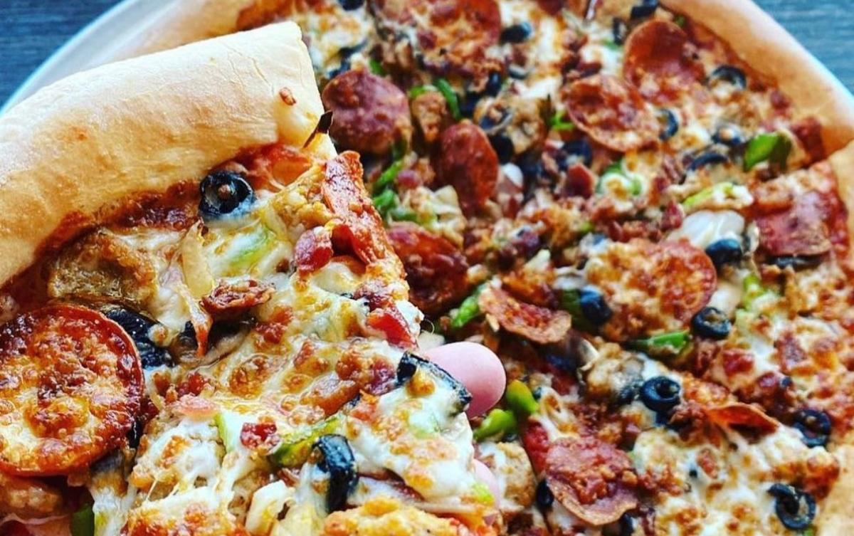 14 Best National Pizza Day Deals— Cheesey Offers Await