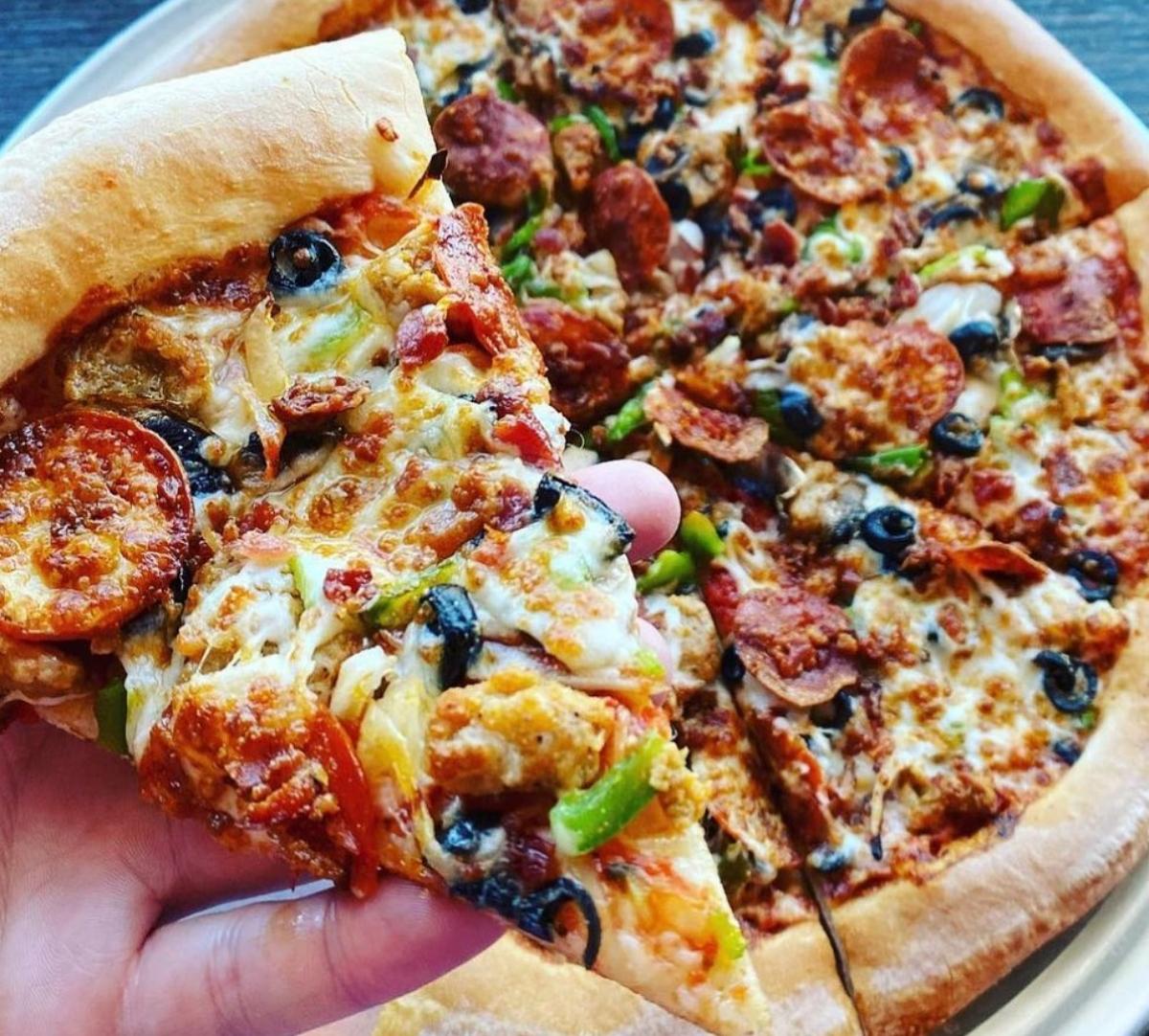 14 Best National Pizza Day Deals— Cheesey Offers Await