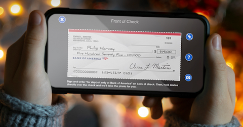 Person using a smartphone for Bank of America online banking