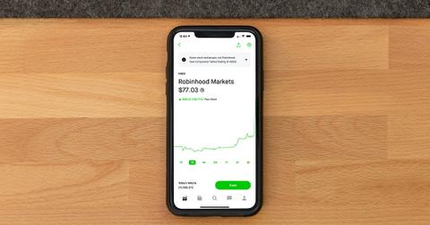 A smartphone displaying a Robinhood Markets price chart