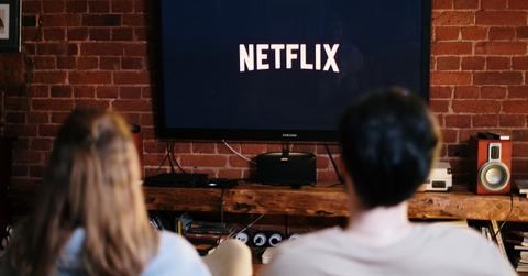 Two people watching Netflix