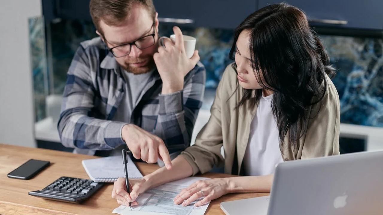 A couple checking their credit score