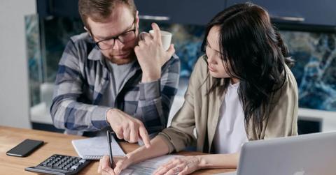 A couple checking their credit score