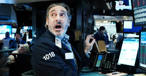 Stock trader looks worried as stocks fall