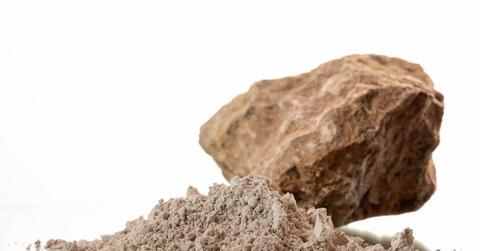 Bastnaesite in the background. NdPr oxide in the foreground.