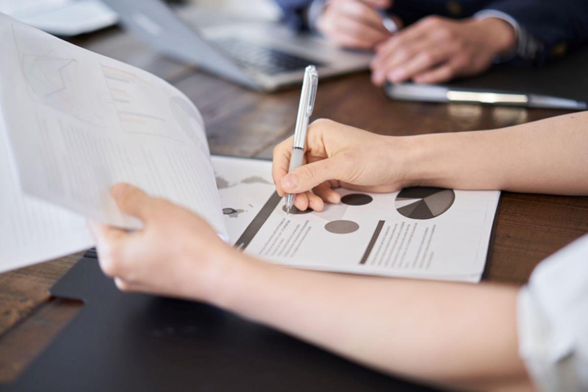 A woman creating a business plan