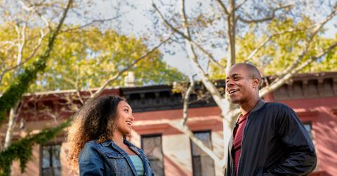 Veterans talking in front of building