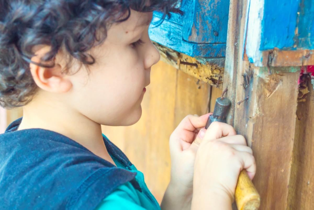 child helping with renovations