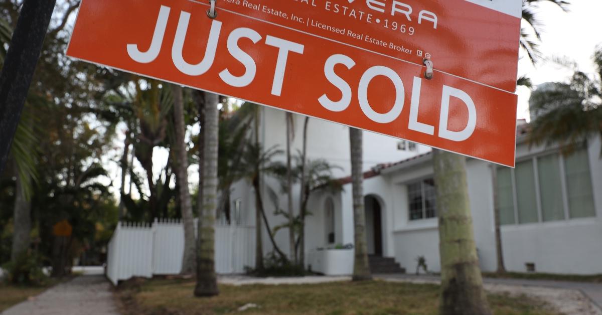 Sold sign on property lawn