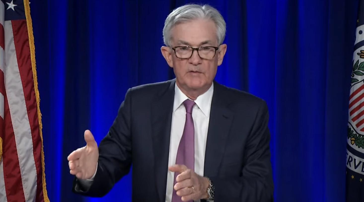 Jerome Powell addressing a press conference