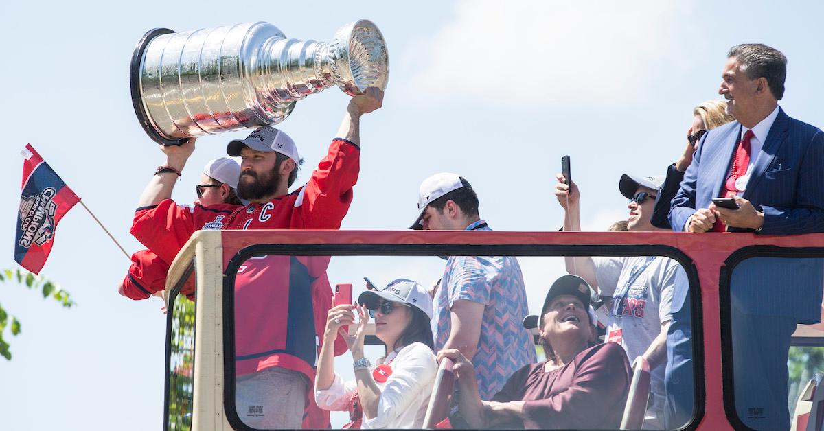 player hoists trophy