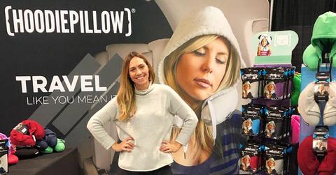 Rebecca Rescate with HoodiePillow store display