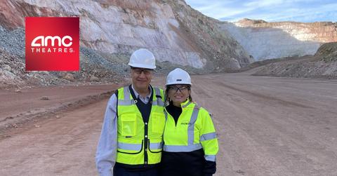 AMC CEO Adam Aron and Hycroft Mining CEO and President Diane Garrett and the AMC logo