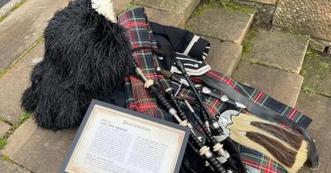 Bagpipes, kilt, and Scottish land title