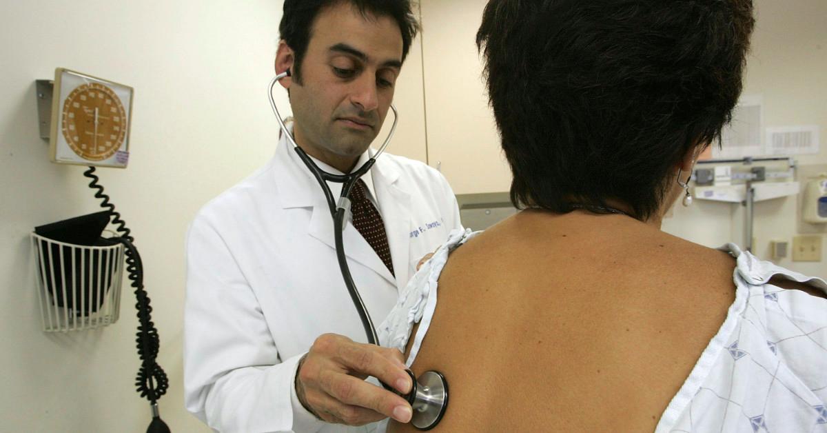 Doctor examining a patient