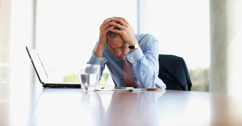 A stressed man at work