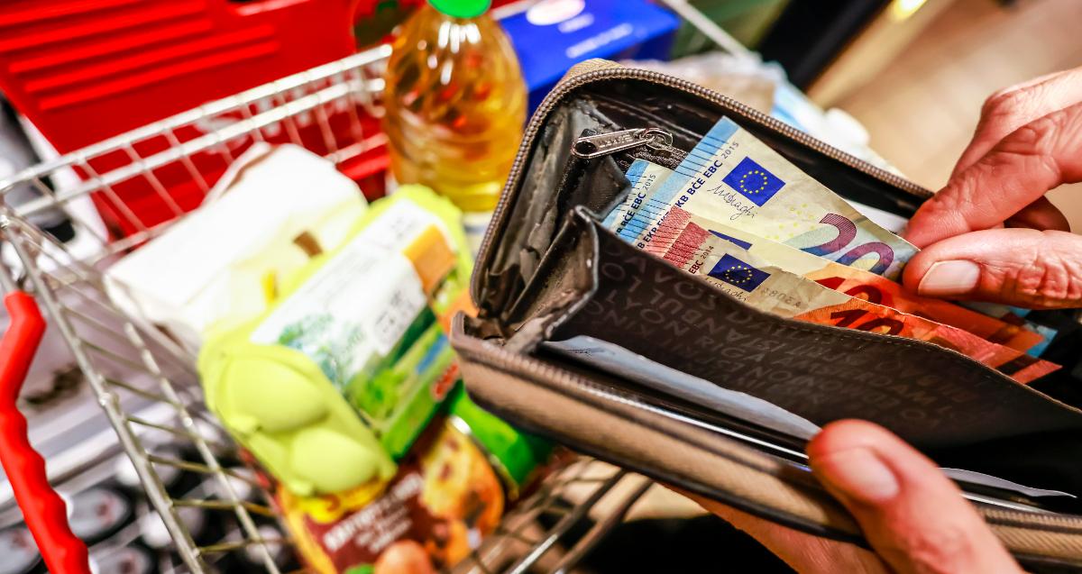 Person shopping at a grocery store amid rising inflation