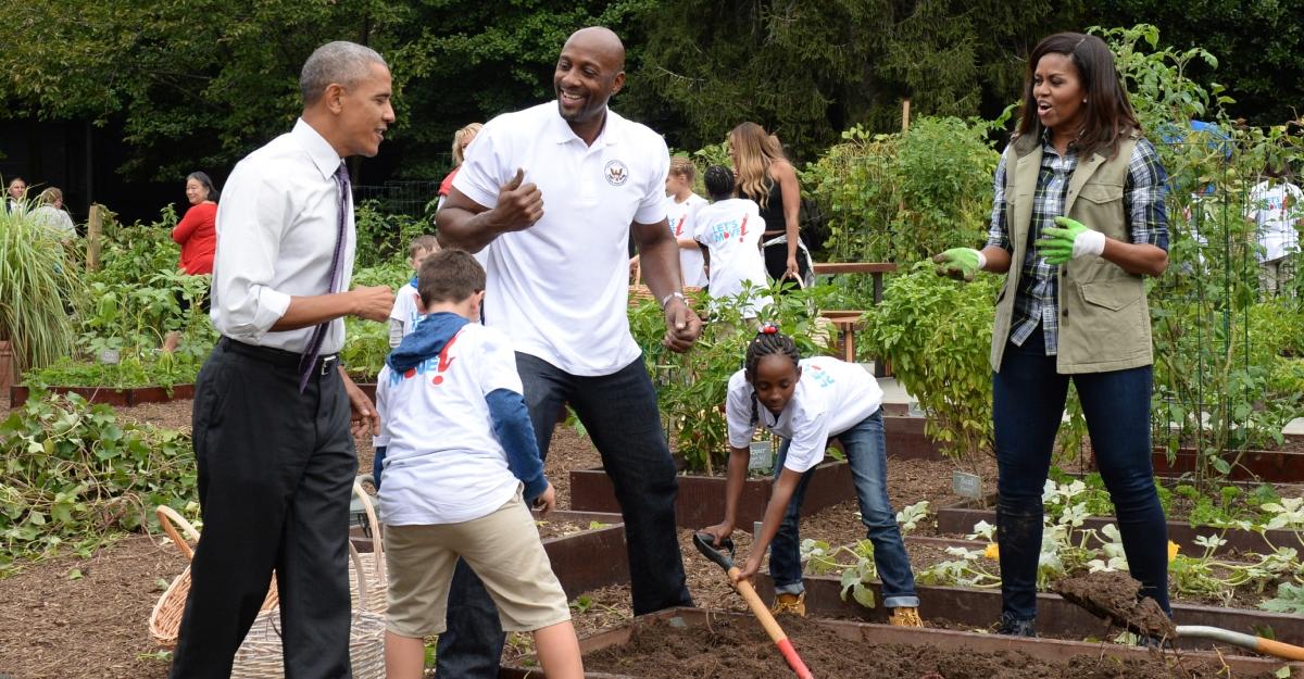The Obamas work in the White House kitchen garden